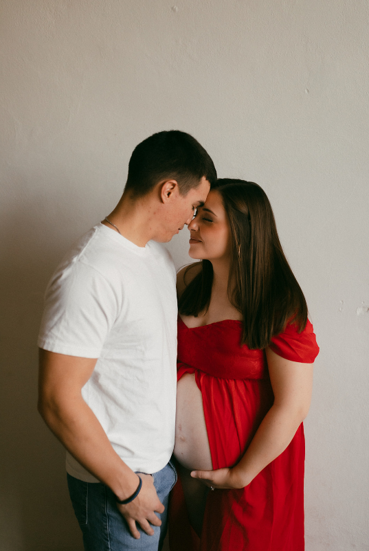 Red gown maternity photos