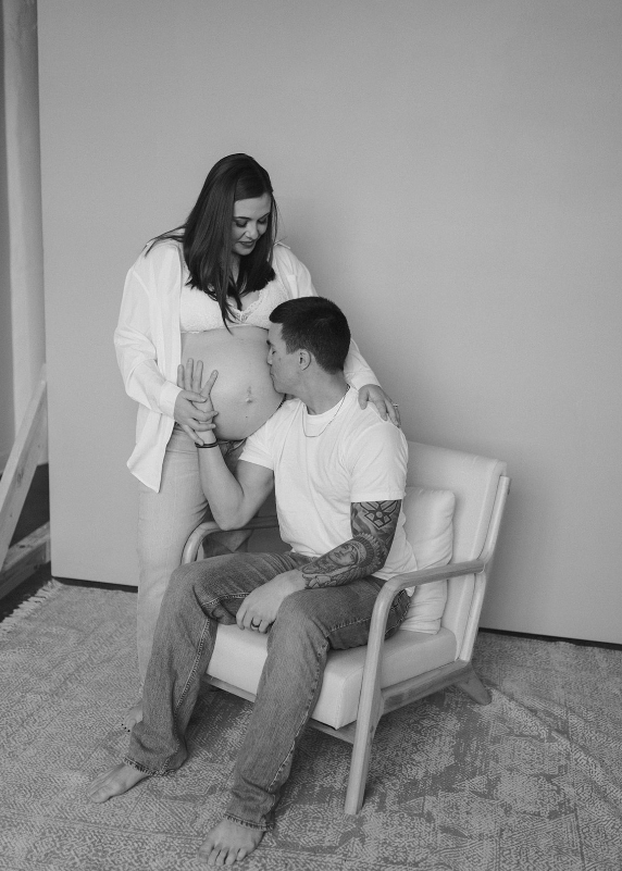 Madison, Wisconsin natural light studio, couple posing for maternity photos