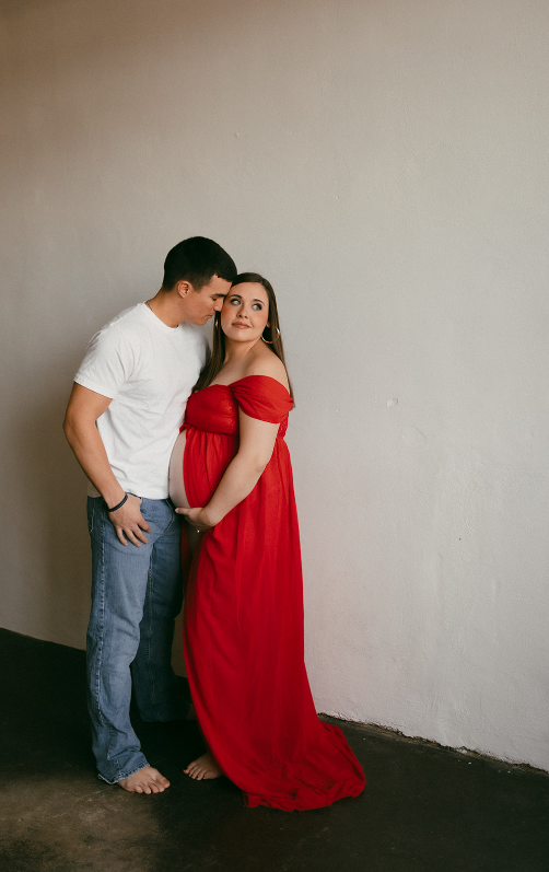 Red gown maternity photos