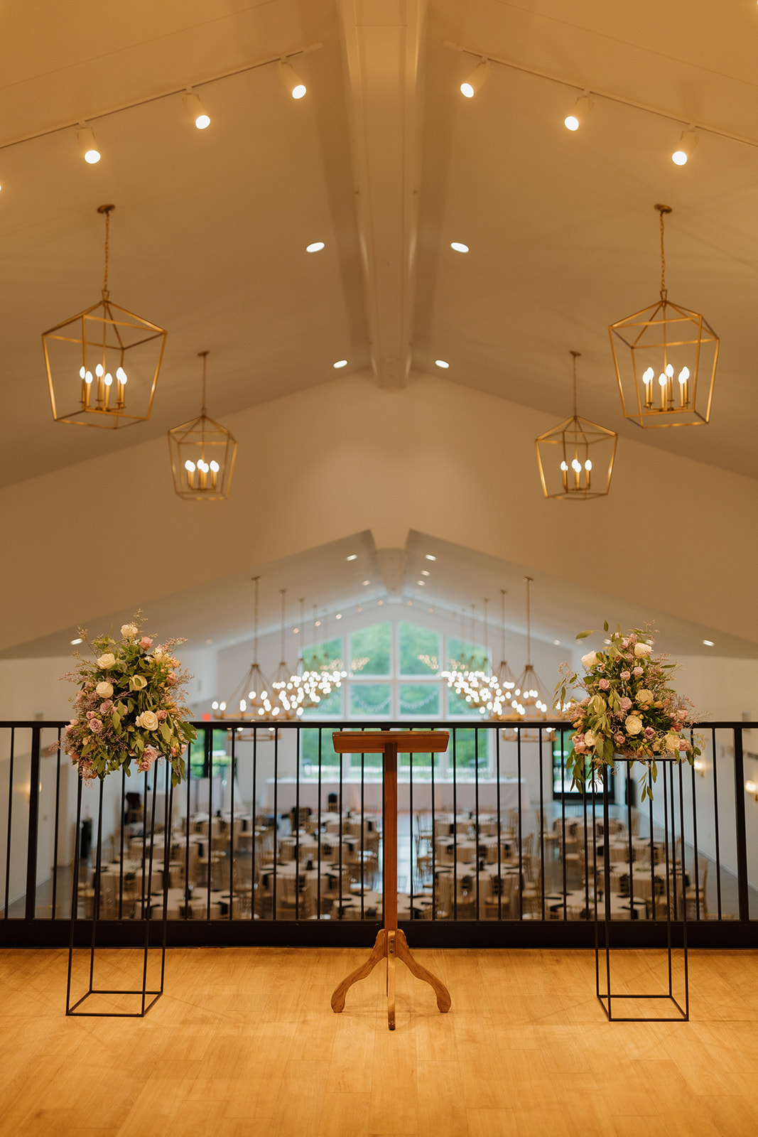 Floral ceremony setup overlooking reception space at The Eloise, one of the top wedding venues in Madison