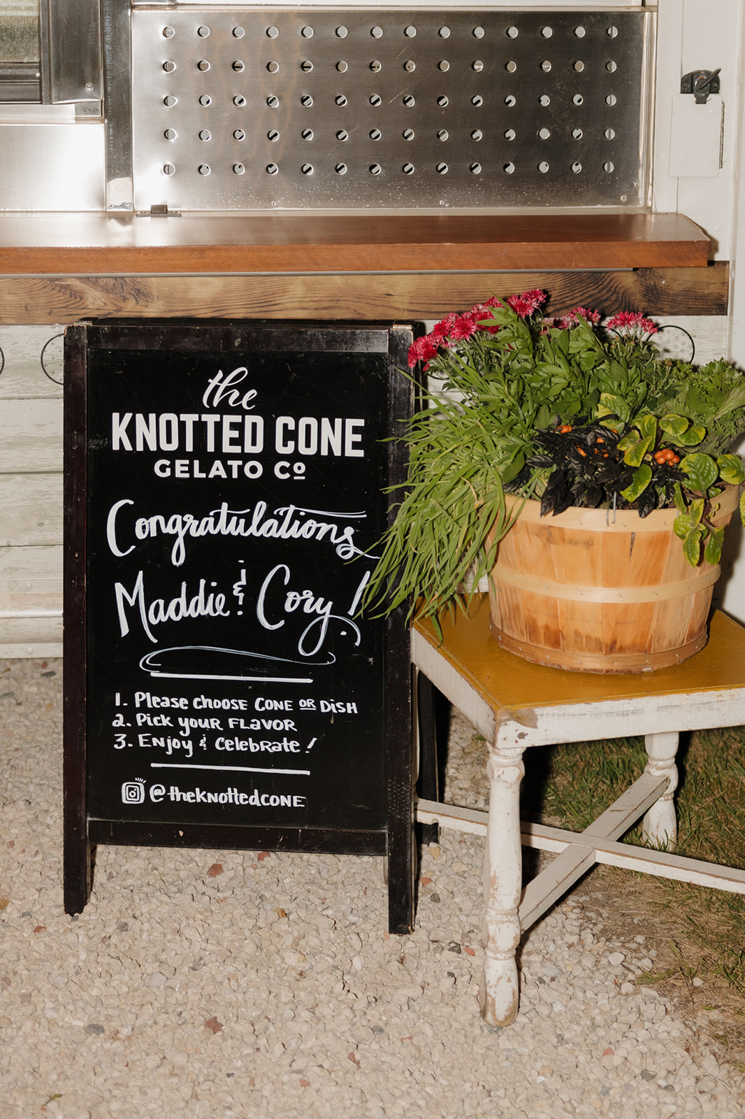 Black and white sign for the Knotted Cone Gelato Co. for guests to enjoy after intimate wedding ceremony