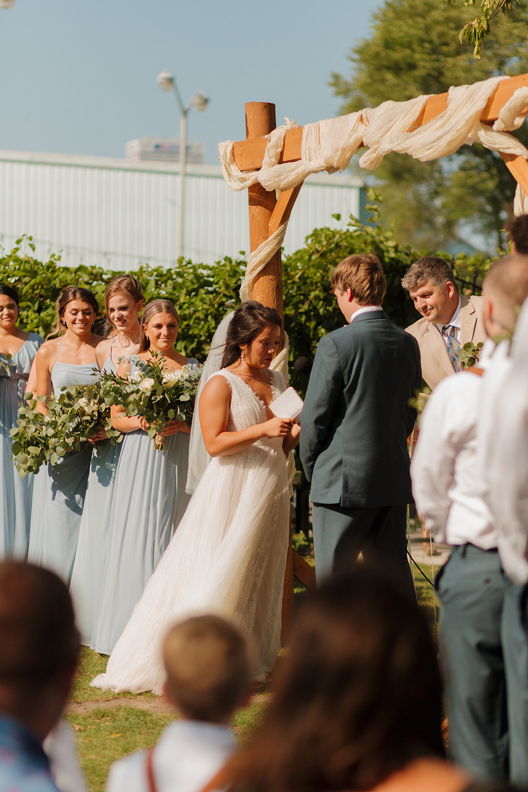 Bride begins reading her vows to her groom